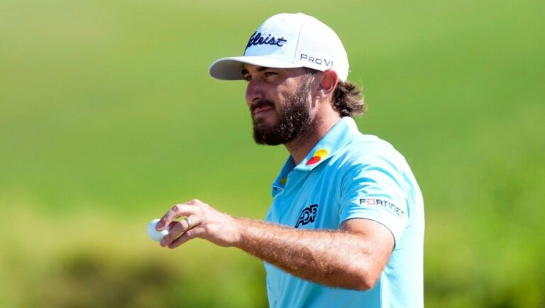 Max Homa acknowledges the gallery from the 18th green during the final round of the Tournament of Champions golf event, Sunday, Jan. 8, 2023, at Kapalua Plantation Course in Kapalua, Hawaii.
