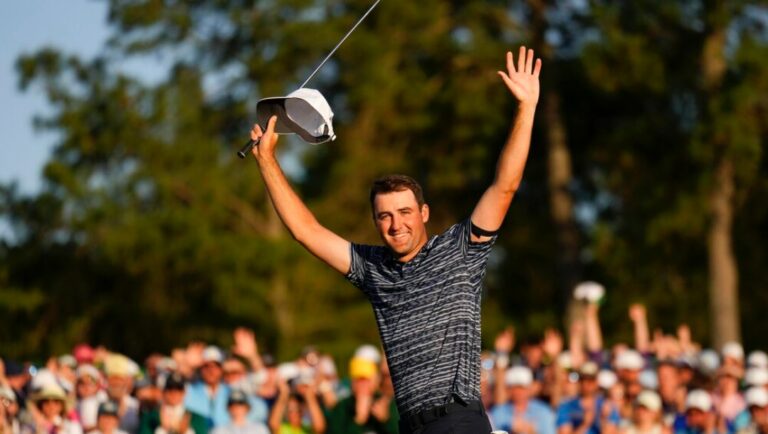 Scottie Scheffler celebrates after winning the 86th Masters golf tournament on Sunday, April 10, 2022, in Augusta, Ga.