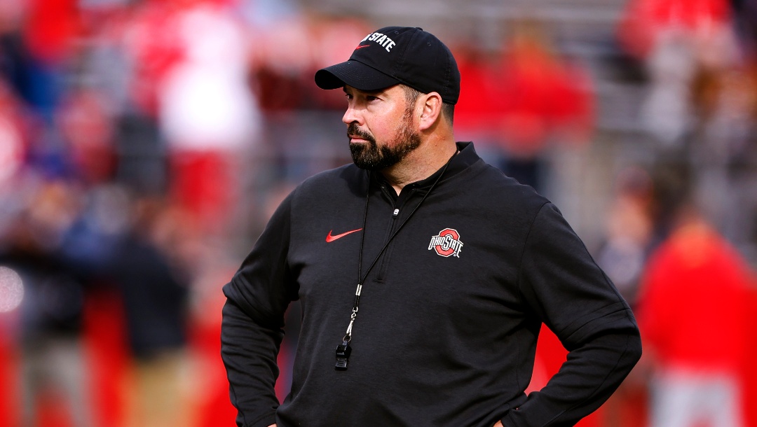 Ohio State head coach Ryan Day observes Rutgers during warm up before a NCAA college football game, Saturday, Nov. 3, 2023, in Piscataway, N.J. (AP Photo/Noah K. Murray)