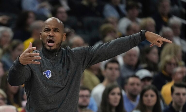 The Seton Hall Pirates coach with a look of confused frustration