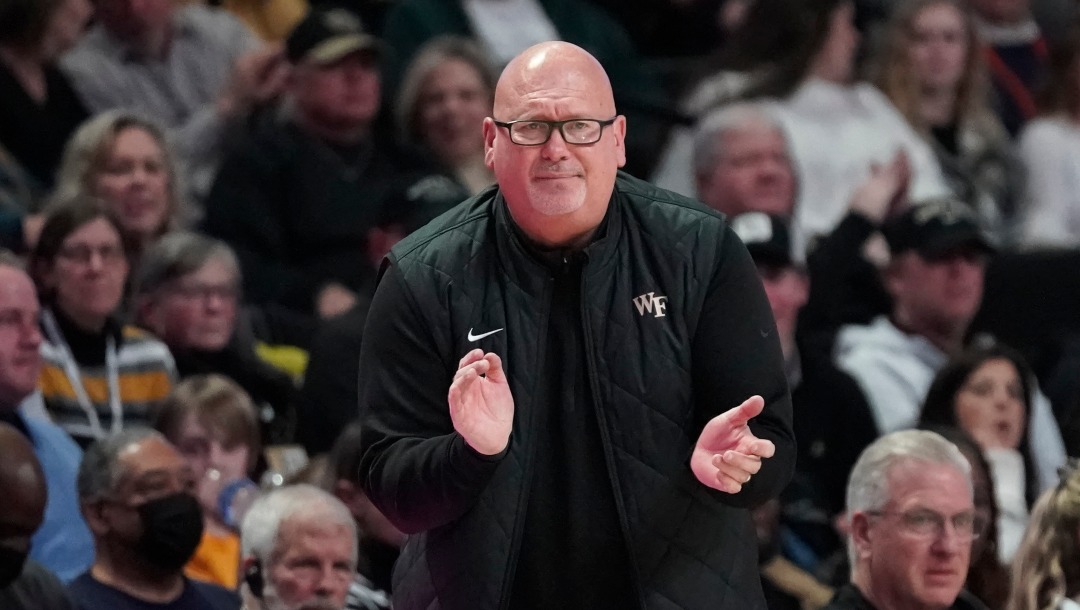 Wake Forest head coach Steve Forbes cheers on his team during the second half of an NCAA college basketball game against Virginia in Winston-Salem, N.C., Saturday, Jan. 21, 2023.