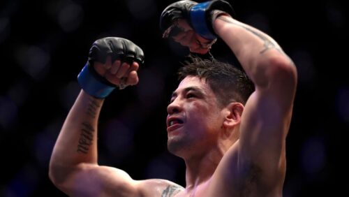 Mexico's Brandon Moreno, celebrates victory over Brazil's Gilbert Durinho in their flyweight title bout at the UFC 283.