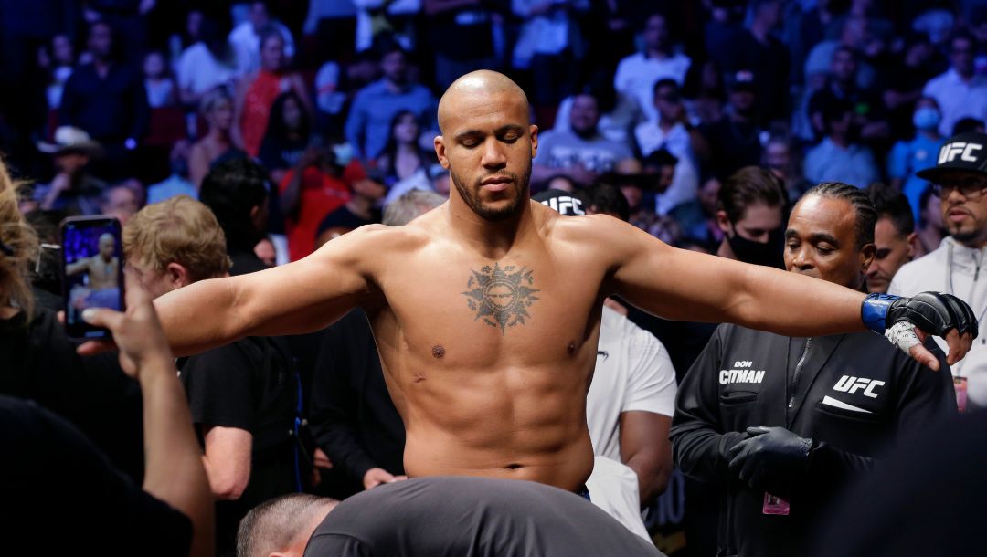 Ciryl Gane is checked over by officials before entering the octagon with Derrick Lewis for their interim heavyweight.