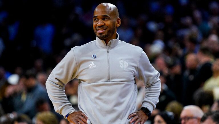 Saint Peter's head coach Shaheen Holloway looks on during the second half of a college basketball game against Purdue in the Sweet 16 round of the NCAA tournament, Friday, March 25, 2022, in Philadelphia.