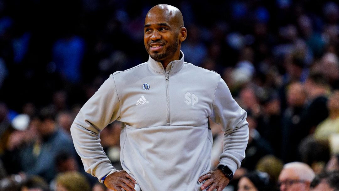 Saint Peter's head coach Shaheen Holloway looks on during the second half of a college basketball game against Purdue in the Sweet 16 round of the NCAA tournament, Friday, March 25, 2022, in Philadelphia.