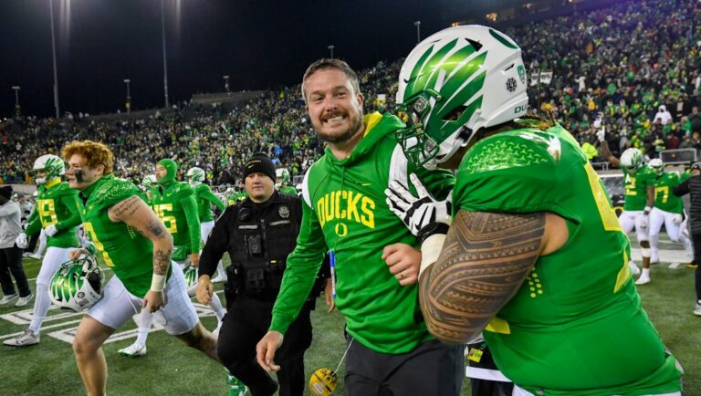 Oregon head coach Dan Lanning celebrates the Ducks' 20-17 win over Utah in an NCAA college football game Saturday, Nov. 19, 2022, in Eugene, Ore.