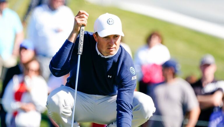 Jordan Spieth reads the green on the second hole as he prepares putt during the first round of the Phoenix Open golf tournament Thursday, Feb. 9, 2023, in Scottsdale, Ariz.