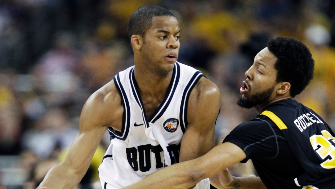 5, 33 during the first half of a men's NCAA Final Four semifinal college basketball game Saturday, March 2, 2011, in Houston. (AP Photo/David J. Phillip)