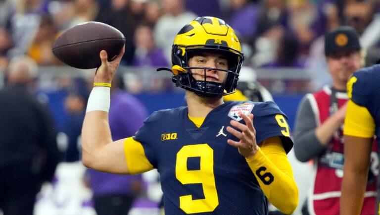 Michigan quarterback J.J. McCarthy (9) during the first half of the Fiesta Bowl NCAA college football semifinal playoff game against TCU, Saturday, Dec. 31, 2022, in Glendale, Arizona. (AP Photo/Rick Scuteri)