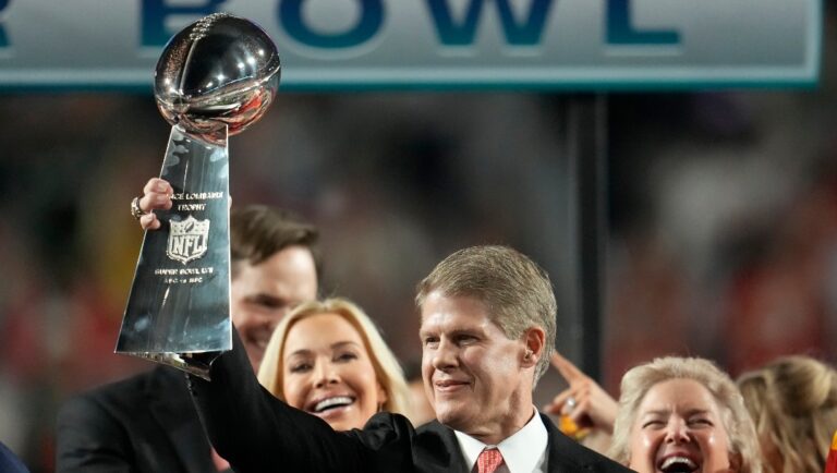 Kansas City Chiefs owner Clark Hunt holds the Vince Lombardi Trophy after the NFL Super Bowl 57 football game against the Philadelphia Eagles, Sunday, Feb. 12, 2023, in Glendale, Ariz. The Kansas City Chiefs defeated the Philadelphia Eagles 38-35. (AP Photo/Marcio J. Sanchez)