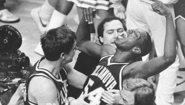 FILE - In this April 1, 1985, file photo, Villanova's Ed Pinckney (54) yells out as he is surrounded by teammates after defeating Georgetown 66-64 in the NCAA college basketball Final Four championship game, in Lexington, Ky. (AP Photo/Gary Landers, File)