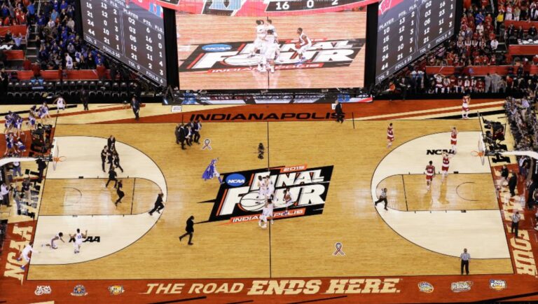 Duke players celebrate on the court after their 68-63 victory over Wisconsin at Lucas Oil Stadium in the NCAA Final Four college basketball tournament championship game in Indianapolis, in this April 6, 2015