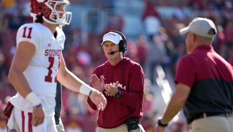 Oklahoma head coach Brent Venables, center, reacts during the second half of an NCAA college football game against Iowa State on Oct. 29, 2022, in Ames, Iowa. After their worst regular season finish in over two decades, the Sooners look to win their third straight bowl and first with Venables as coach, with a winning record at stake on Dec. 29, 2022. The Seminoles had their first winning season since coach Jimbo Fisher left the program in 2017 and look for their first bowl win since the 2017 season.