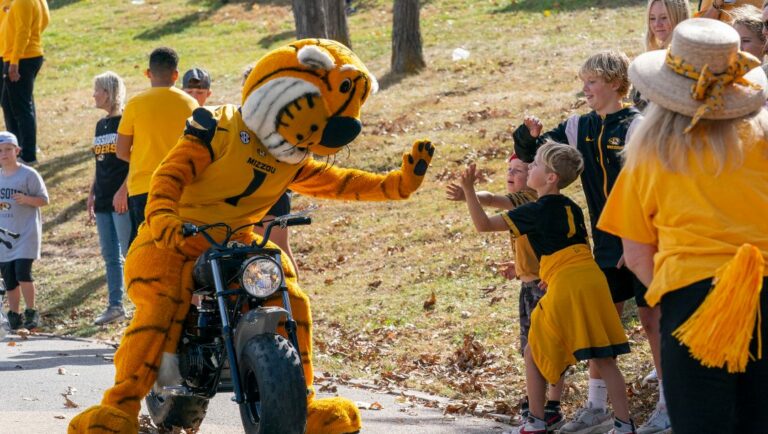 Truman, the Missouri mascot, greets fans outside the stadium before the start of an NCAA college football game against Vanderbilt Saturday, Oct. 22, 2022, in Columbia, Mo.