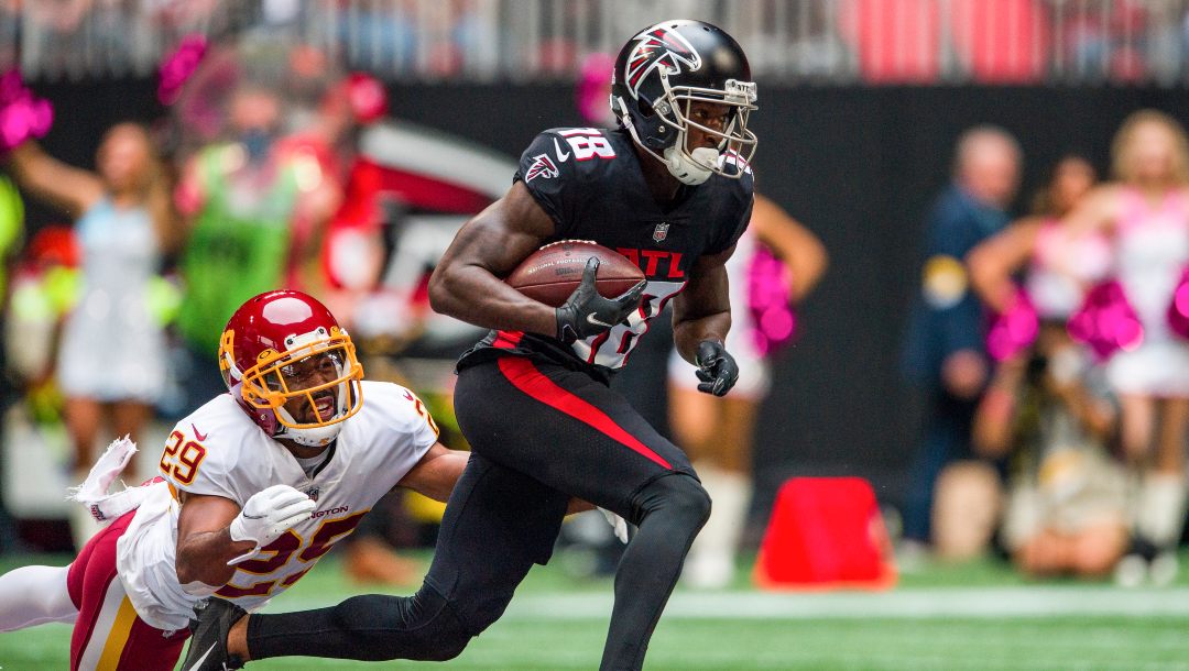Atlanta Falcons wide receiver Calvin Ridley (18) runs the ball as Washington Football Team cornerback Kendall Fuller (29) defends during the first half of an NFL football game on Oct. 3, 2021, in Atlanta. Ridley is getting a fresh start in Jacksonville, although it's unclear when he will be allowed to play again. The Jaguars made a complex deal to land Ridley just before the NFL trading deadline Tuesday, Nov. 1, 2022, according to a person with knowledge of the situation.