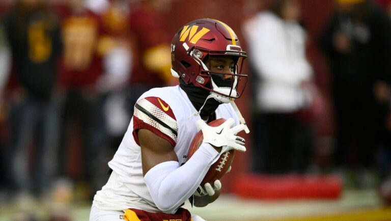 Washington Commanders wide receiver Curtis Samuel (10) warms up before an NFL football game against the Dallas Cowboys, Sunday, Jan. 8, 2023, in Landover, Md.