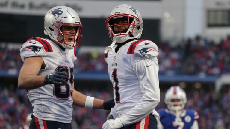 New England Patriots tight end Hunter Henry (85) and wide receiver DeVante Parker (1) celebrate a touchdown during the second half of an NFL football game against the Buffalo Bills on Sunday, Jan. 8, 2023, in Orchard Park, N.Y.