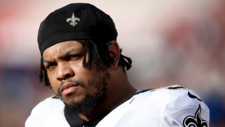 New Orleans Saints' Marcus Davenport stands on the sideline during an NFL football game against the San Francisco 49ers, Nov. 27, 2022, in Santa Clara, Calif. The Minnesota Vikings have ramped up their pass rush by agreeing to terms with former New Orleans defensive end Davenport. The deal was confirmed by a person with direct knowledge of the deal who spoke to The Associated Press on condition of anonymity because free agent contracts can’t be finalized until the new league year begins on Wednesday, March 15, 2023.