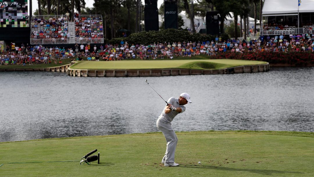 Sergio Garcia, of Spain, hits from the 17th tee during the third round of The Players championship golf tournament at TPC Sawgrass, Saturday, May 10, 2014, in Ponte Vedra Beach, Fla.