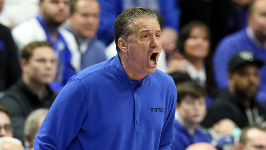 Kentucky head coach John Calipari yells to his team during the second half of an NCAA college basketball game against Tennessee in Lexington, Ky., Saturday, Feb. 18, 2023. Kentucky won 66-54. (AP Photo/James Crisp)