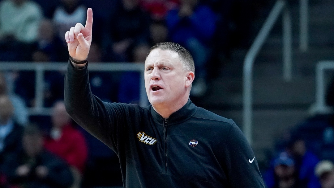 Virginia Commonwealth head coach Mike Rhoades works the bench in the first half of a first-round college basketball game against St. Mary's in the NCAA Tournament, Friday, March 17, 2023, in Albany, N.Y. (AP Photo/John Minchillo)