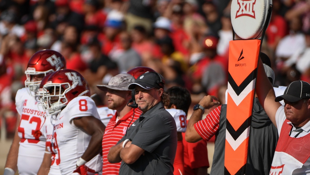 Houston head coach Dana Holgorsen on the sideline against Texas Tech during the second half of an NCAA college football game Saturday, Sept. 10, 2022, in Lubbock, Texas. (AP Photo/Justin Rex)