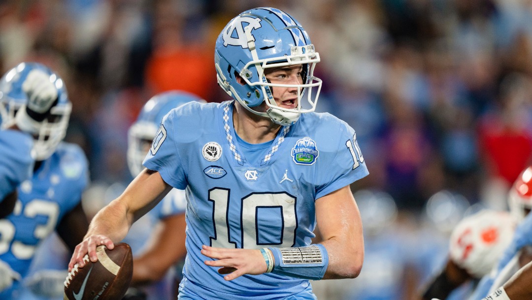 North Carolina quarterback Drake Maye (10) plays against Clemson during the Atlantic Coast Conference championship NCAA college football game on Saturday, Dec. 3, 2022, in Charlotte, N.C. (AP Photo/Jacob Kupferman)
