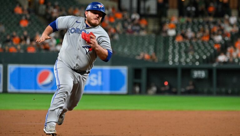 Toronto Blue Jays' Alejandro Kirk runs on the way to scoring on a single by Matt Chapman off Baltimore Orioles starting pitcher Kyle Bradish during the second inning of a baseball game Tuesday, Sept. 6, 2022, in Baltimore.