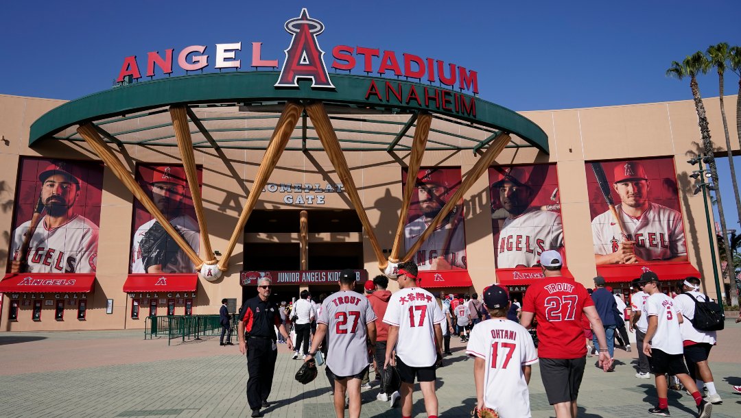 Fans enter Angels Stadium before a baseball game between the Los Angeles Angels and the Houston Astros Thursday, April 7, 2022, in Anaheim, Calif.
