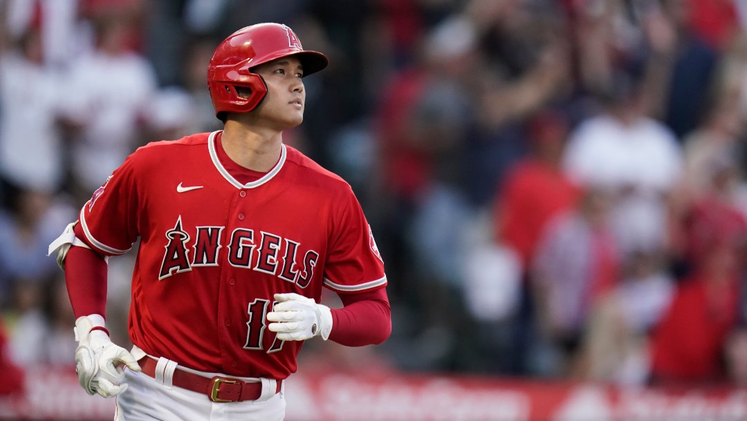 Los Angeles Angels' Shohei Ohtani, of Japan, rounds the bases after hitting a three-run home run during the third inning of a baseball game against the Texas Rangers Saturday, July 30, 2022, in Anaheim, Calif.