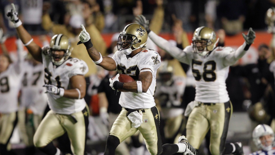 FILE - In this Feb. 7, 2010, file photo, New Orleans Saints cornerback Tracy Porter (22) reacts as he returns an interception 74 yards for a touchdown against the Indianapolis Colts during the second half of the NFL Super Bowl XLIV football game, in Miami. As part of its celebration of its 100th season, the NFL is designating a Game of the Week, each chosen to highlight a classic matchup. For this week, it is the Colts-Saints game. (AP Photo/Mike Groll, File)
