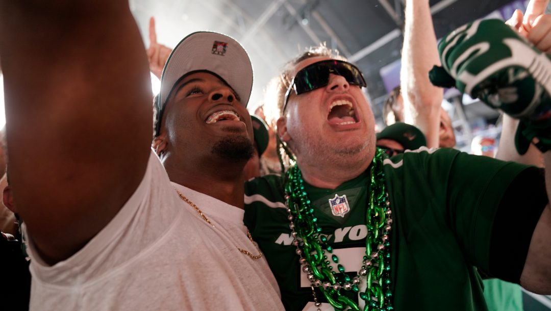 Iowa state running back Breece Hall takes selfies with fans after being selected by the New York Jets during the second round of the NFL football draft Friday, April 29, 2022, in Las Vegas.