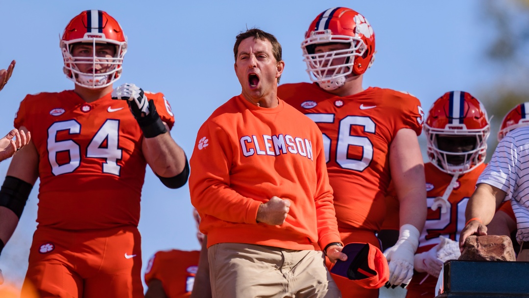 Clemson head coach Dabo Swinney reacts at the top of the hill before the start of an NCAA college football game against South Carolina on Saturday, Nov. 26, 2022, in Clemson, S.C. (AP Photo/Jacob Kupferman)
