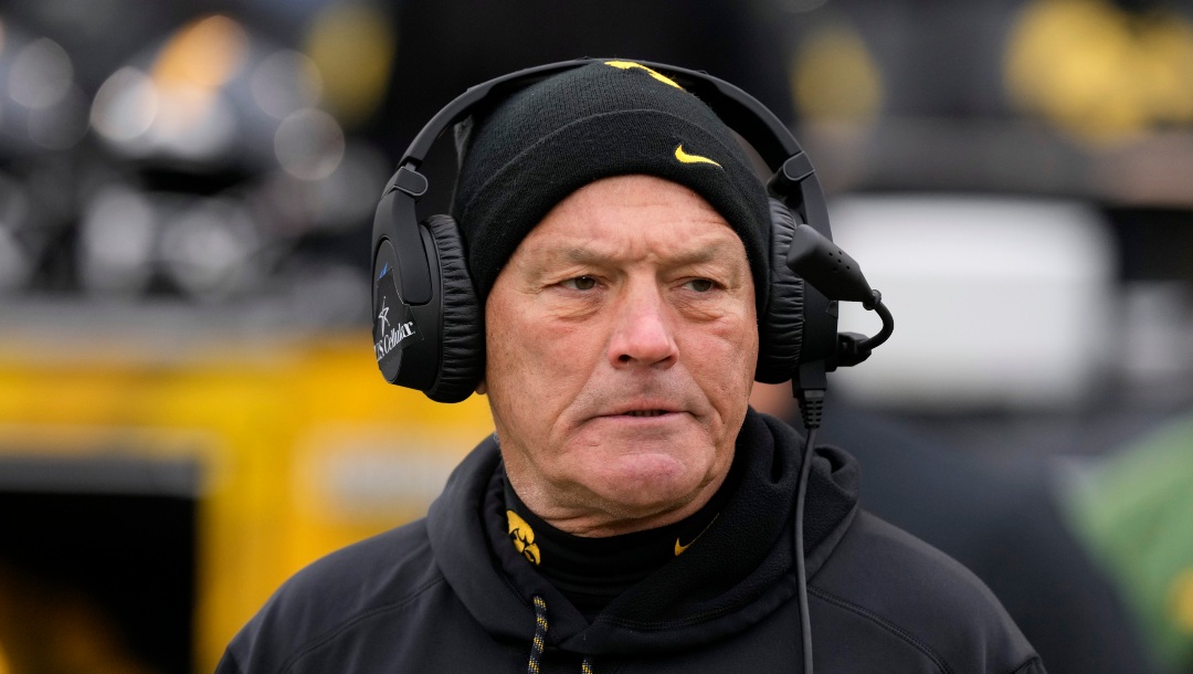 Iowa head coach Kirk Ferentz stands on the field before an NCAA college football game against Wisconsin, Saturday, Nov. 12, 2022, in Iowa City, Iowa. (AP Photo/Charlie Neibergall)