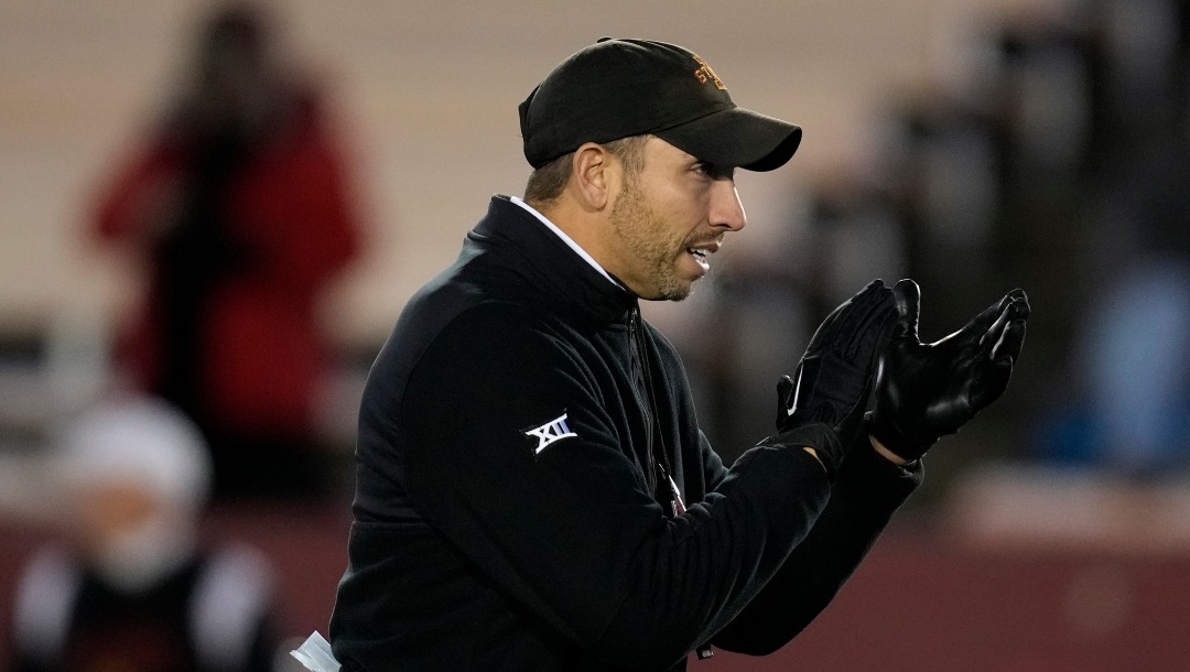 Iowa State head coach Matt Campbell watches his team warmup before an NCAA college football game against Texas Tech, Saturday, Nov. 19, 2022, in Ames, Iowa. (AP Photo/Charlie Neibergall)