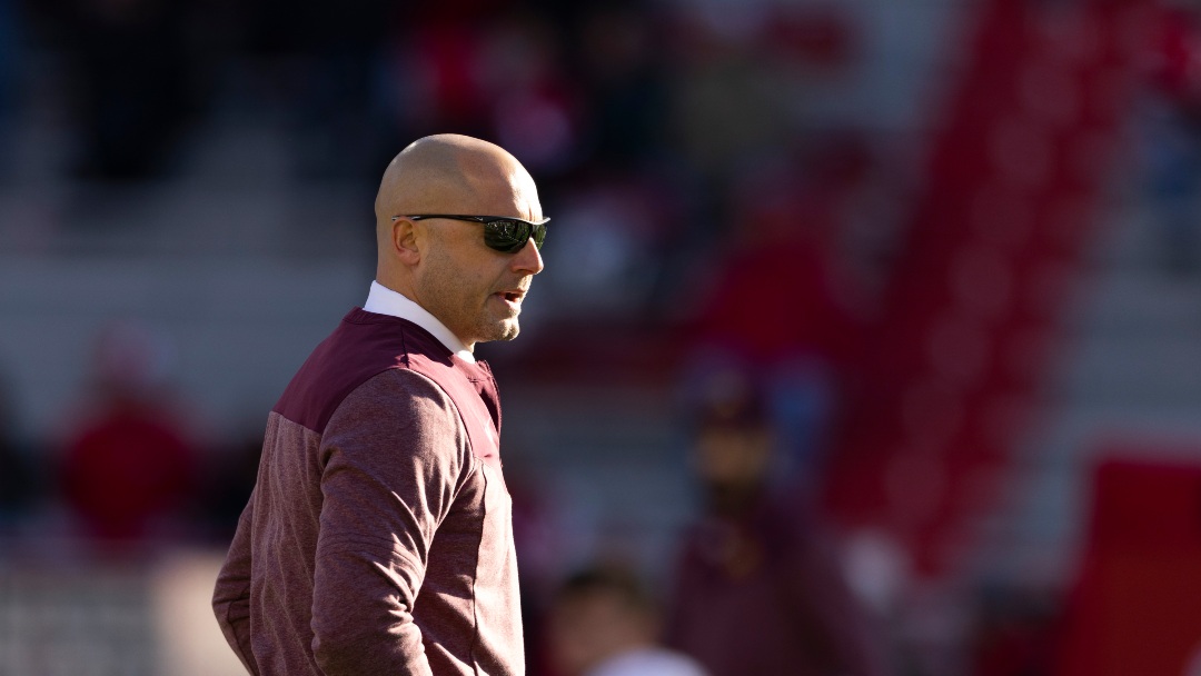 Minnesota head coach P.J. Fleck watches his team warm up before playing in an NCAA college football game against Nebraska Saturday, Nov. 5, 2022, in Lincoln, Neb. (AP Photo/Rebecca S. Gratz)