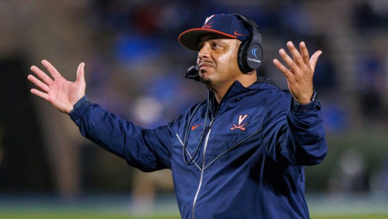 Virginia coach Tony Elliott reacts to a call on the field during the first half of the team's NCAA college football game against Duke in Durham, N.C., Saturday, Oct. 1, 2022. (AP Photo/Ben McKeown)