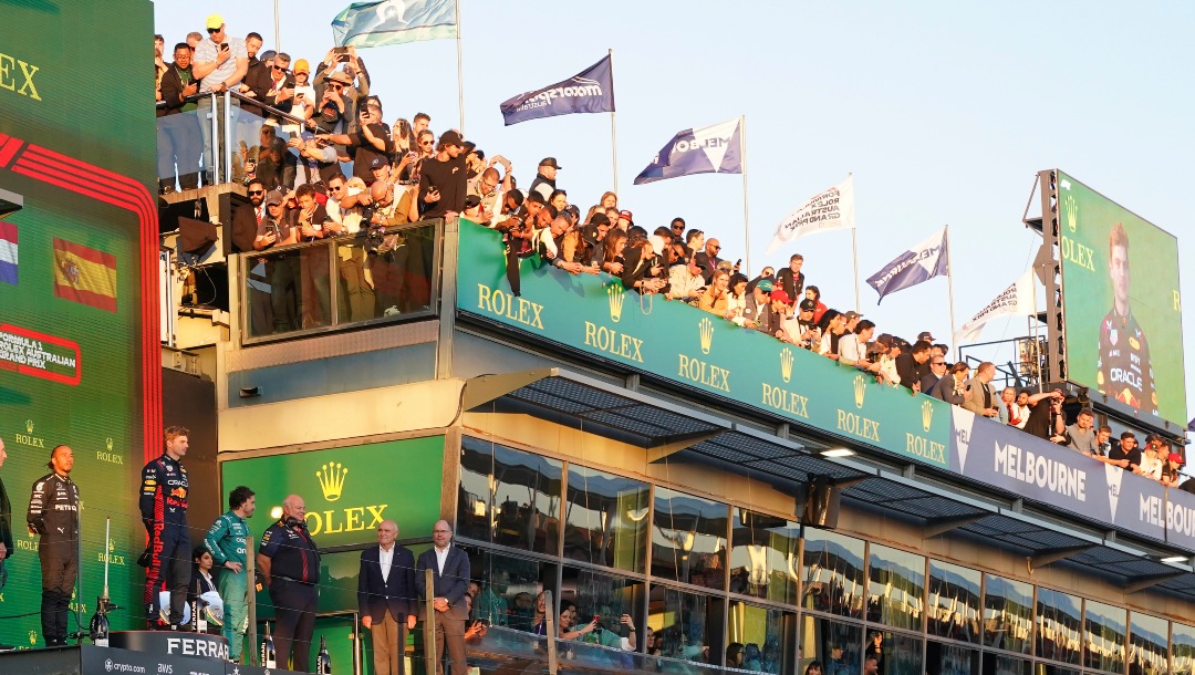 Mercedes driver Lewis Hamilton of Britain, left, Red Bull driver Max Verstappen of Netherlands, second left, and Aston Martin driver Fernando Alonso of Spain, third left, stand on the podium after the Australian Formula One Grand Prix at Albert Park in Melbourne, Sunday, April 2, 2023. Verstappen won the race while Hamilton came 2nd and Alonso took 3rd.