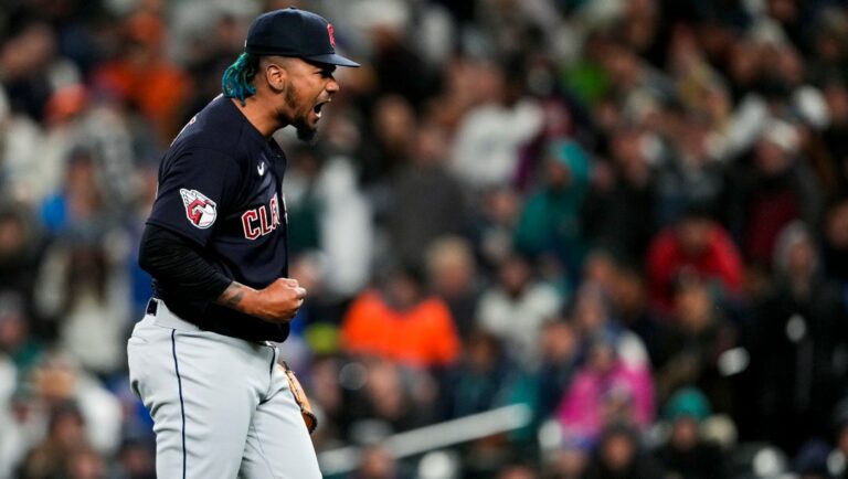 Cleveland Guardians relief pitcher Emmanuel Clase reacts after striking out Seattle Mariners' Eugenio Suarez to end the baseball game Saturday, April 1, 2023, in Seattle.