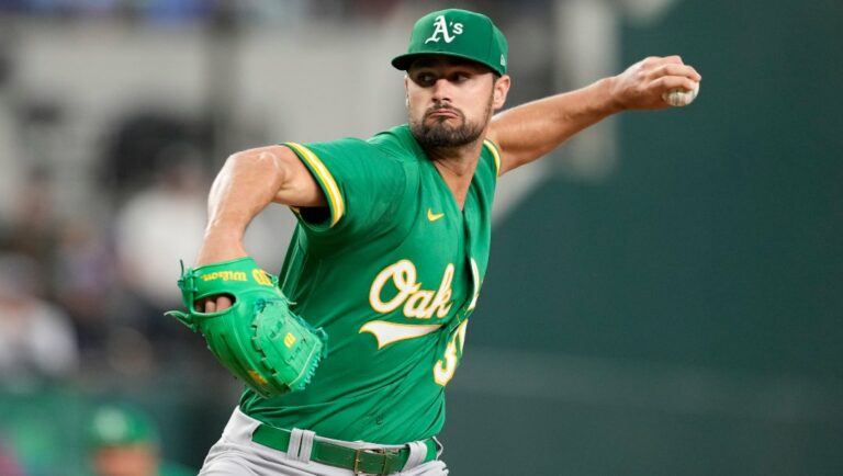 Oakland Athletics starting pitcher Kyle Muller delivers a pitch to the Texas Rangers during the first inning of a baseball game, Sunday, April 23, 2023, in Arlington, Texas.