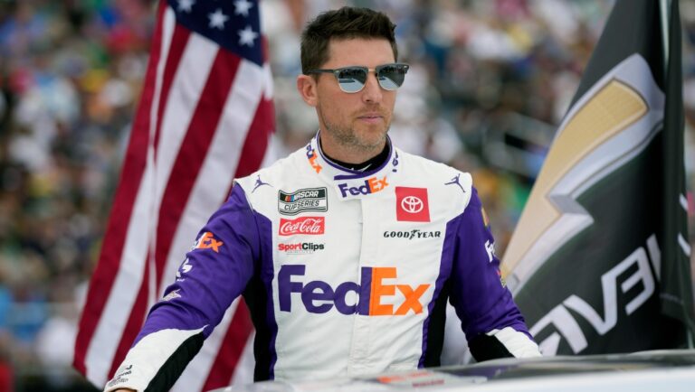 Denny Hamlin during driver introductions before the NASCAR Daytona 500 auto race at Daytona International Speedway, Sunday, Feb. 19, 2023, in Daytona Beach, Fla. (AP Photo/John Raoux)
