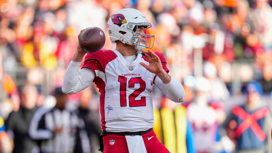 Arizona Cardinals quarterback Colt McCoy (12) passes against the Denver Broncos during the first half of an NFL football game Sunday, Dec. 18, 2022, in Denver. (AP Photo/Jack Dempsey)