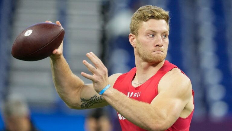 Kentucky quarterback Will Levis runs a drill at the NFL football scouting combine in Indianapolis, Saturday, March 4, 2023. (AP Photo/Darron Cummings)