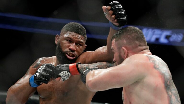 Daniel Omielanczuk, right, fights Curtis Blaydes in a heavyweight mixed martial arts bout at UFC 213, Saturday, July 8, 2017.