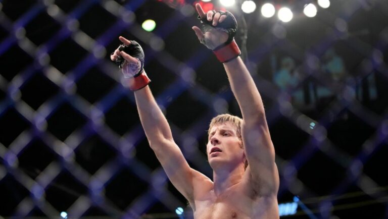 Paddy Pimblett celebrates after defeating Jared Gordon during a UFC 282 mixed martial arts lightweight bout.