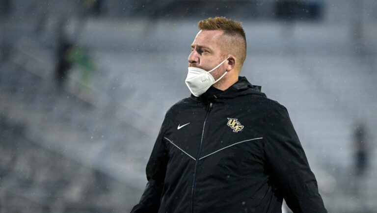 Central Florida co-offensive coordinator and tight ends coach Alex Golesh watches warmups before an NCAA college football game against Tulsa, Saturday, Oct. 3, 2020, in Orlando, Fla.