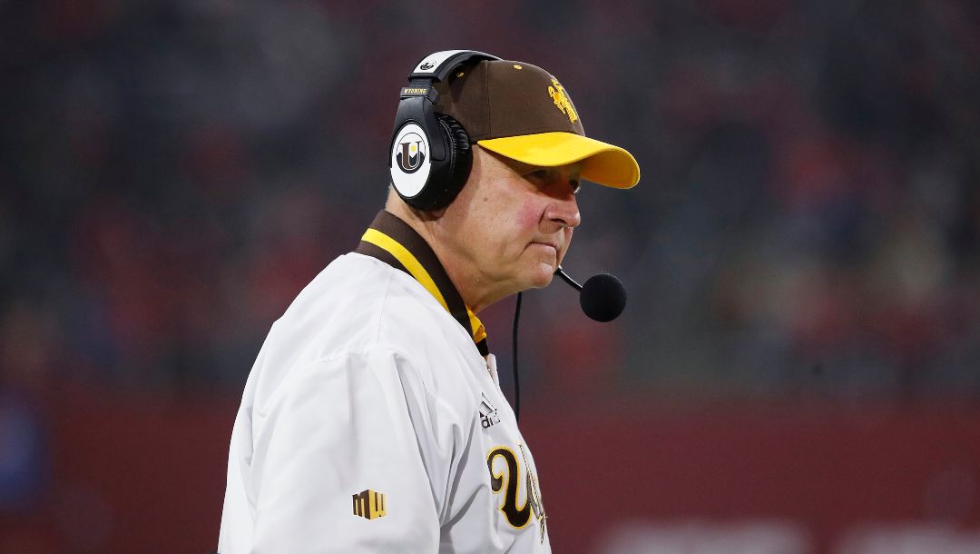 Wyoming coach Craig Bohl watches his team take on Fresno State during the first half of an NCAA college football game in Fresno, Calif., Friday, Nov. 25, 2022.