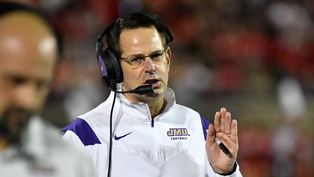 James Madison head coach Curt Cignetti signals in a play during the first half of an NCAA college football game against Louisville in Louisville, Ky., Saturday, Nov. 5, 2022.