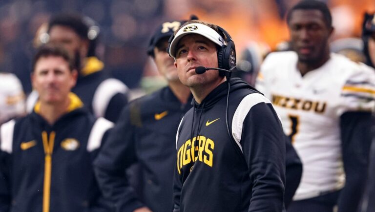 Missouri head coach Eliah Drinkwitz watches play on the Jumbotron during the second half of an NCAA college football game against Tennessee Saturday, Nov. 12, 2022, in Knoxville, Tenn. Tennessee won 66-24.