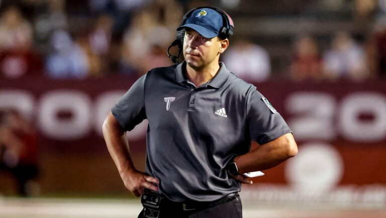 Troy head coach Jon Sumrall reacts after a play during the first half of an NCAA college football game against Marshall, Sept. 24, 2022, in Troy, Ala. Sumrall has agreed to a new four-year contract as Troy’s coach after leading the Trojans to a Sun Belt Conference championship and national ranking in his debut season.